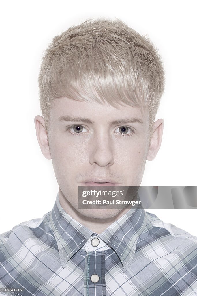 Bleach blonde headshot of boy