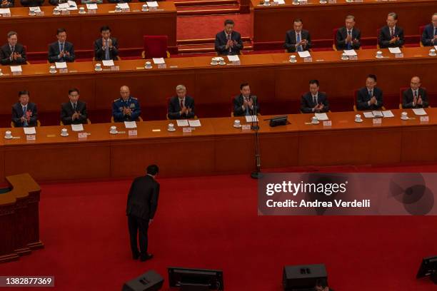 Member of the Standing Committee of the Politburo of the Communist Party of China Li Zhanshu bows towards Chinese President Xi Jinping before giving...