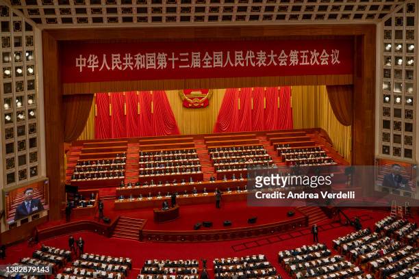 Member of the Standing Committee of the Politburo of the Communist Party of China Li Zhanshu gives a speech during the Second Plenary Session of the...
