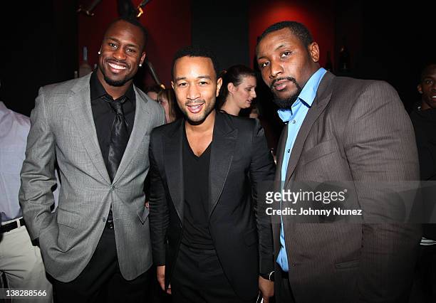 Vernon Davis, John Legend and Navorro Bowman attend The Blitz at Sensu on February 4, 2012 in Indianapolis, Indiana.