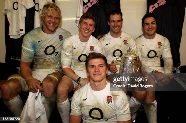 Mouritz Botha, David Strettle, Owen Farrell, Charlie Hodgson and Brad Barritt of England pose with the Calcuta Cup following his team's 13-6 victory...