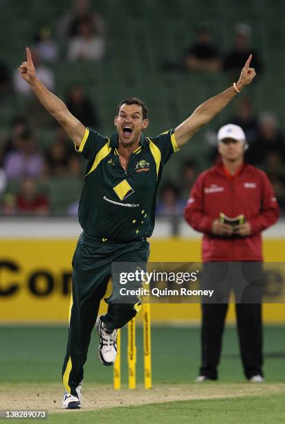 Clint McKay of Australia celebrates the wicket of Rohit Sharma of India during game one of the Commonwealth Bank tri-series between Australia and...