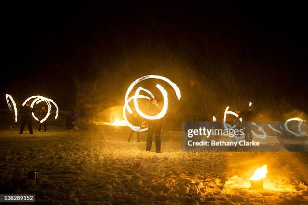 In driving snow torches representing the return of the sun are used in a symbolic battle against winter on February 4, 2012 in Huddersfield, England....