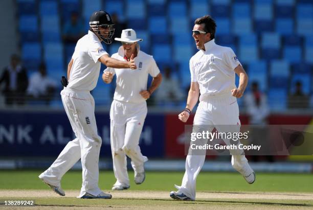 Graeme Swann celebrates with Alastair Cook after dismissing Abdur Rehman of Pakistan during the 3rd Test match between Pakistan and England at The...