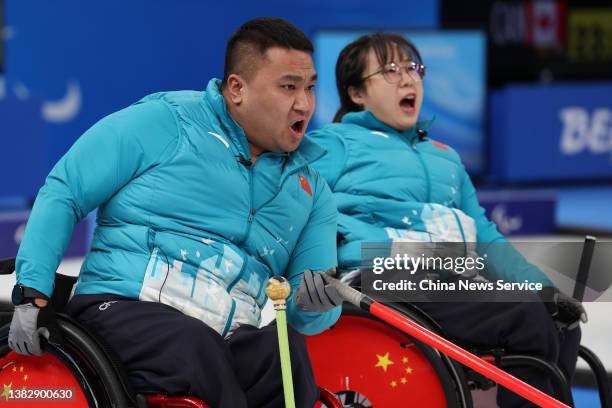 Wang Haitao and Yan Zhuo of Team China compete during the Wheelchair Curling Round Robin Session 8 between China and Switzerland on day three of the...