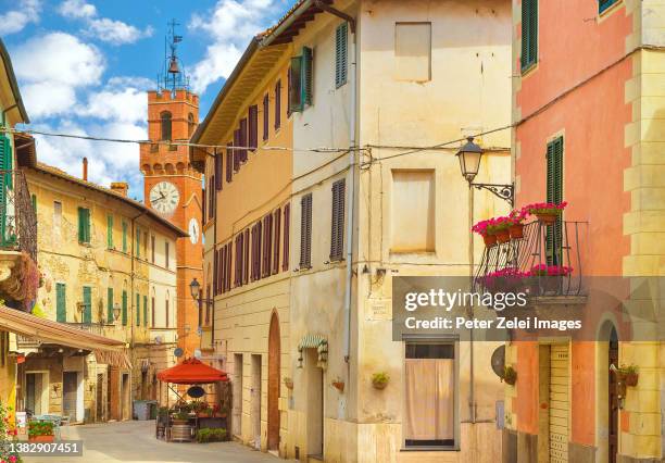 asciano, town in tuscany, italy - asciano stock-fotos und bilder