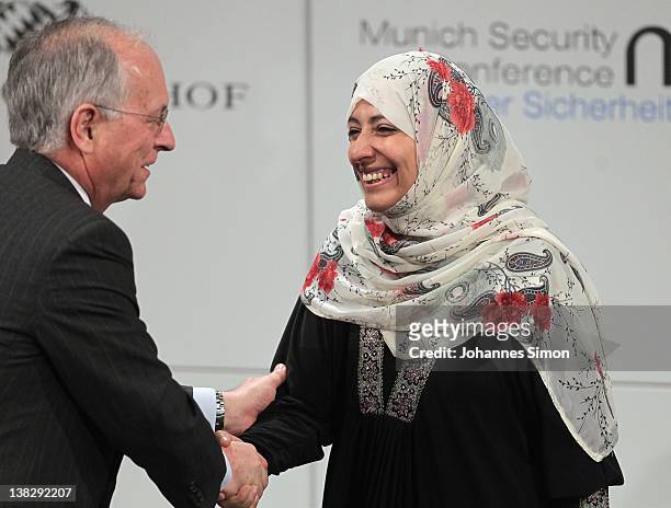 Wolfgang Ischinger , chairman of the 48th Munich security conference welcomes Tawakkul Karman, Nobel peace laureate 2011, during day 3 of the 48th...
