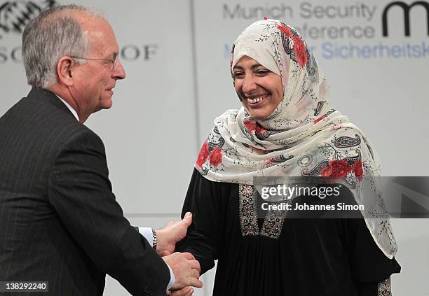 Wolfgang Ischinger , chairman of the 48th Munich security conference welcomes Tawakkul Karman, Nobel peace laureate 2011, during day 3 of the 48th...