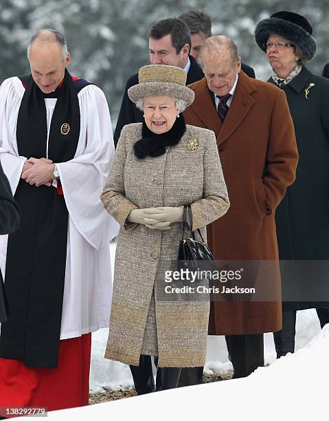 Queen Elizabeth II and Prince Philip, Duke of Edinburgh leave the Sunday Service at West Newton Church on February 5, 2012 in King's Lynn, England.