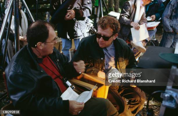 Director Bernardo Bertolucci with producer Jeremy Thomas on the set of the film 'Little Buddha', circa 1992.