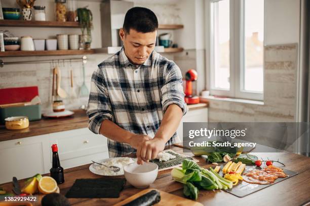 1,435 Man Cooking Rice Stock Photos, High-Res Pictures, and Images ...