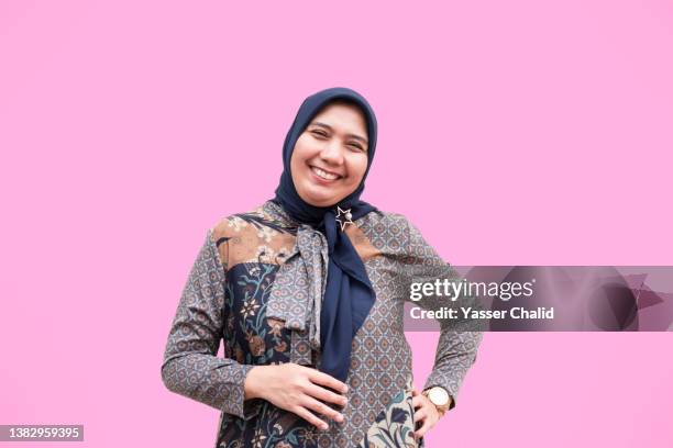 portrait of pregnant woman - malaysia batik stock pictures, royalty-free photos & images