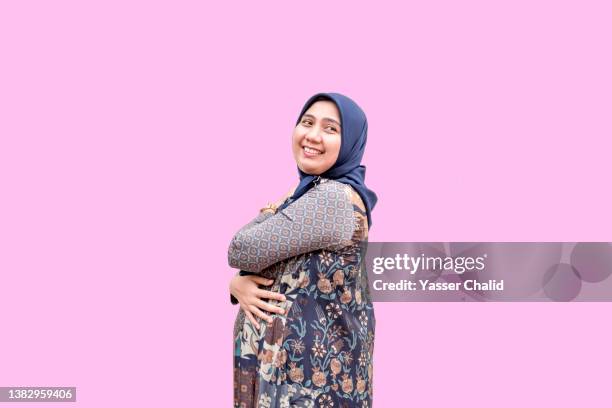 portrait of pregnant woman - pregnant muslim stock pictures, royalty-free photos & images