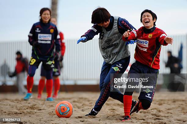 Ji So-Yun and Yukari Kinga of INAC of INAC Kobe Leonessa Ladies duel for the ball during a session at the Club Natacion Barcelona sport complex in La...
