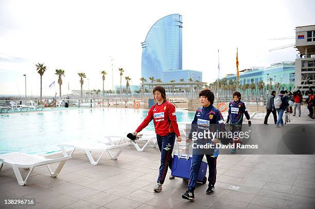 Kobe Leonessa ladies players are seen after a training session at the Club Natacion Barcelona sport complex in La Barceloneta beach on February 5,...
