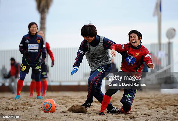 Ji So-Yun and Yukari Kinga of INAC of INAC Kobe Leonessa Ladies duel for the ball during a session at the Club Natacion Barcelona sport complex in La...