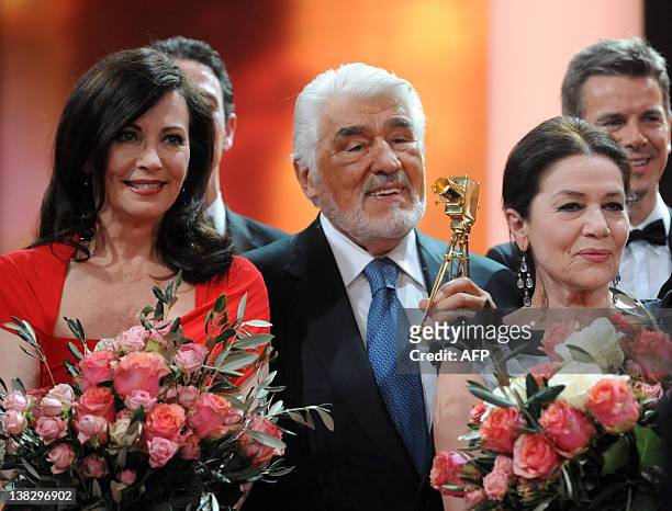 German actors Iris Berben , Mario Adorf and Hannelore Elsner on stage after the 47th Golden Camera award ceremony in Berlin, Germany, on February 4,...