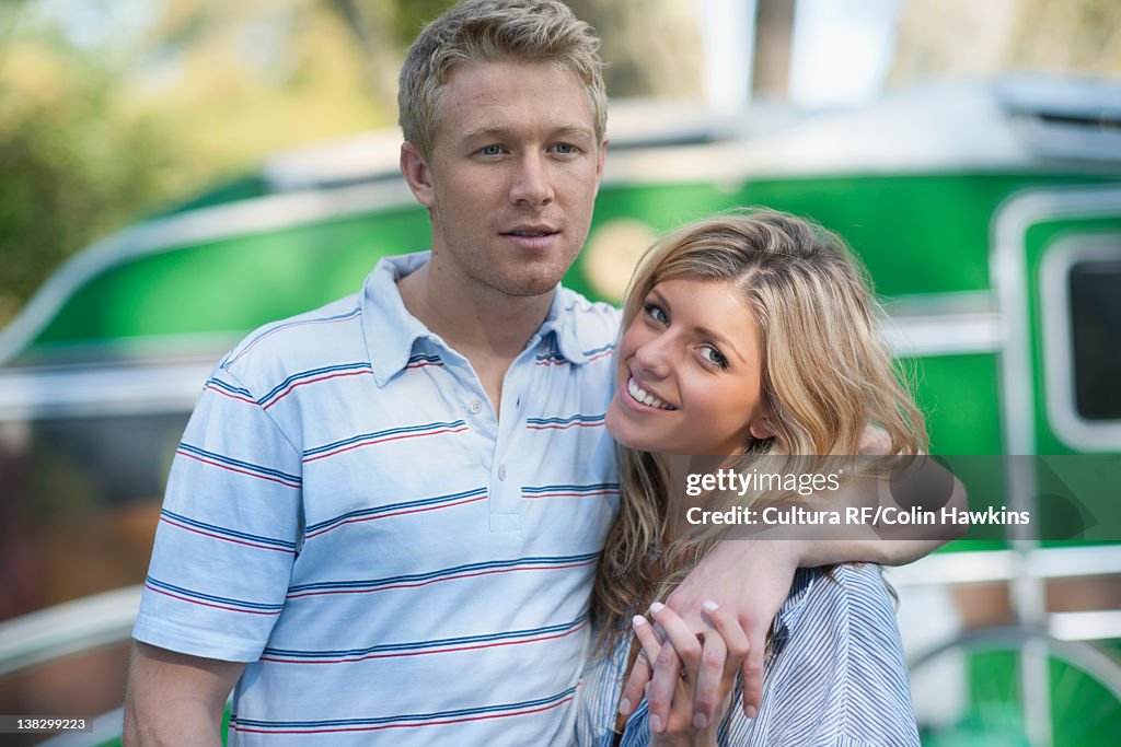 Couple standing together outdoors