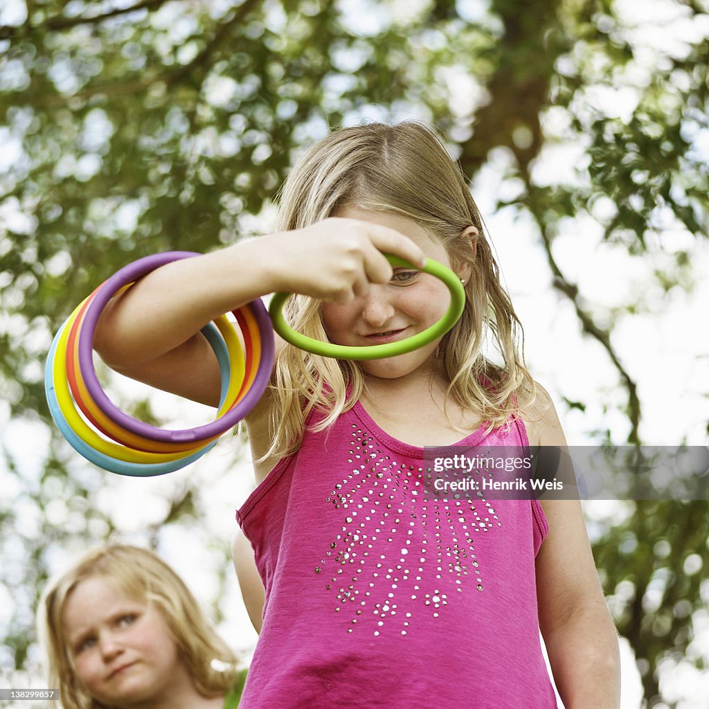 Throw Ring Sign Girl Throwing Rings Outdoors High-Res Stock Photo - Getty Images