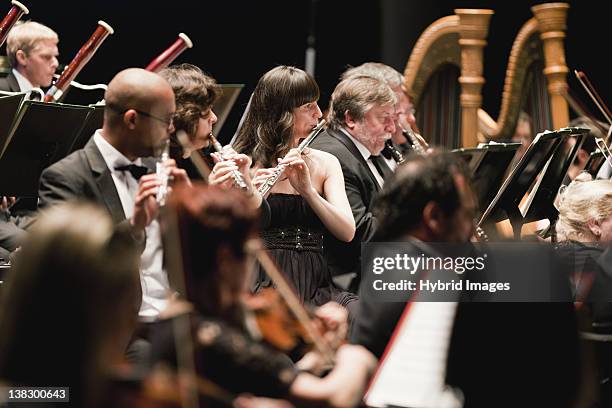 winds section in orchestra - orchestre photos et images de collection