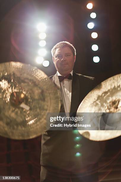 cymbals player in orchestra - cymbal stock pictures, royalty-free photos & images