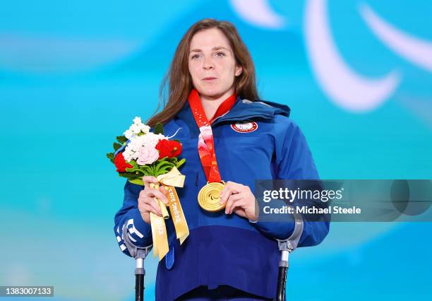 Gold medallist Kendall Gretsch of Team United States celebrates during the Women's Para Biathlon Middle Distance Sitting medal ceremony at the...