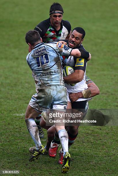 Darryl Marfo of Quins is tackled by Ceri Sweeney of Cardiff during the LV= Cup match between Cardiff Blues and Harlequins at the Cardiff City Stadium...