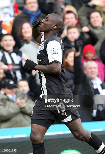 Demba Ba celebrates after scoring the first goal during the Barclays Premier League match between Newcastle United and Aston villa at The Sports...