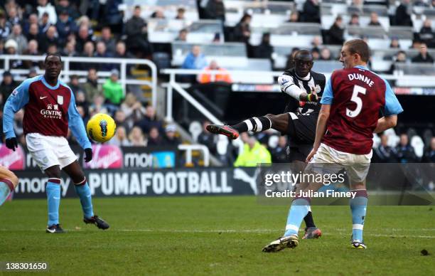 Papiss Cisse of Newcastle scores his teams second goal during the Barclays Premier League match between Newcastle United and Aston Villa at Sports...