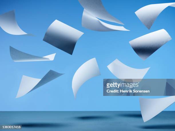 white paper flying - flying letters stock-fotos und bilder