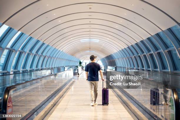 passenger  walking in the airport terminal. - changi airport stock pictures, royalty-free photos & images