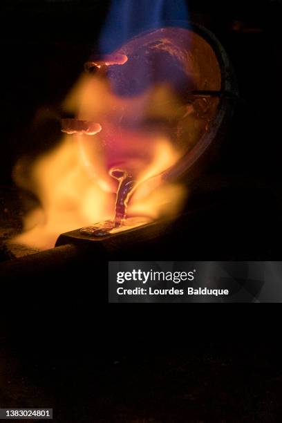 foundry in jewelry workshop - molten stock pictures, royalty-free photos & images