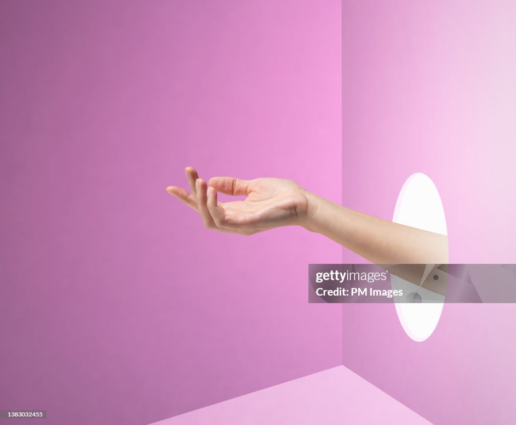 Elegant hand reaching in