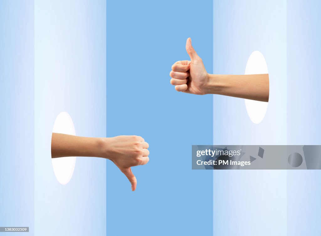Thumb up one thumb down