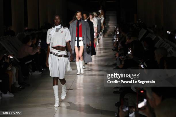 Models walk the runway during the Miu Miu Womenswear Fall/Winter 2022-2023 show as part of Paris Fashion Week on March 08, 2022 in Paris, France.