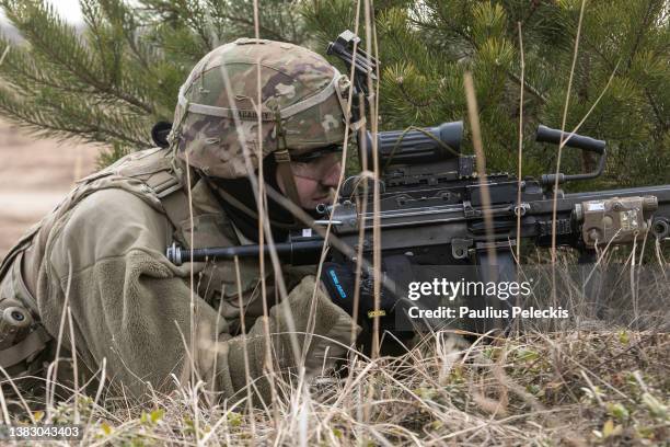 Members of the US army participate in the Crystal Arrow 2022 exercise on March 8, 2022 in Adazi, Latvia. Approximately 2,800 soldiers from Albania,...