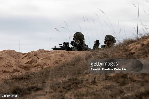 Members of the Canadian army participate in the Crystal Arrow 2022 exercise on March 8, 2022 in Adazi, Latvia. Approximately 2,800 soldiers from...