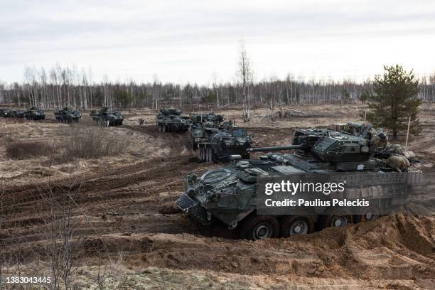 Members of the US army participate in the Crystal Arrow 2022 exercise on March 8, 2022 in Adazi, Latvia. Approximately 2,800 soldiers from Albania,...