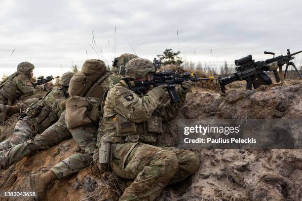 Members of the US army participate in the Crystal Arrow 2022 exercise on March 8, 2022 in Adazi, Latvia. Approximately 2,800 soldiers from Albania,...