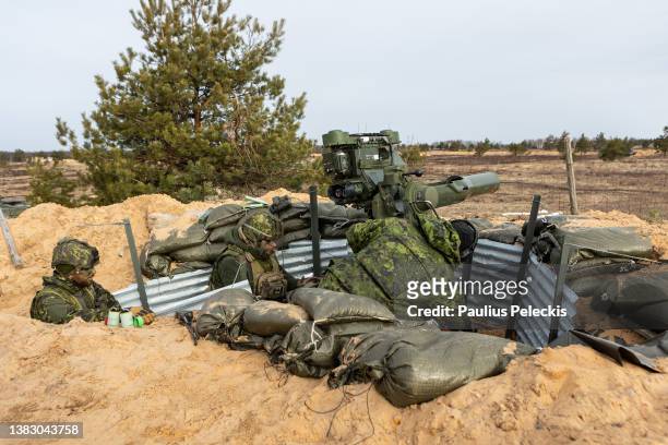 Members of the Canadian army participate in the Crystal Arrow 2022 exercise on March 8, 2022 in Adazi, Latvia. Approximately 2,800 soldiers from...