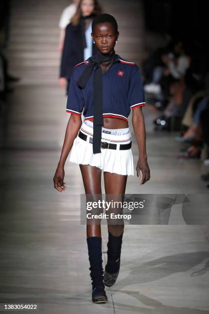 Model walks the runway during the Miu Miu Womenswear Fall/Winter 2022-2023 show as part of Paris Fashion Week on March 8, 2022 in Paris, France.