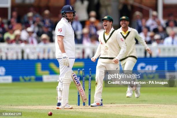 England's Jonny Bairstow looks frustrated after being run out by Australia's Alex Carey as players celebrate during day five of the second Ashes test...