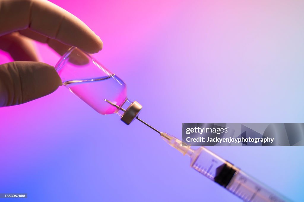 Syringe and Coronavirus vaccine