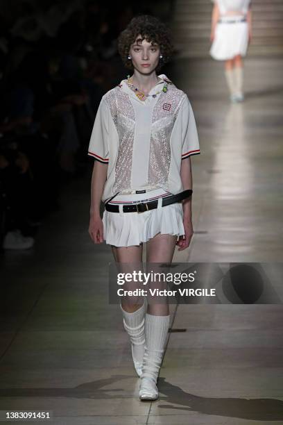 Model walks the runway during the Miu Miu Ready to Wear Fall/Winter 2022-2023 fashion show as part of the Paris Fashion Week on March 8, 2022 in...