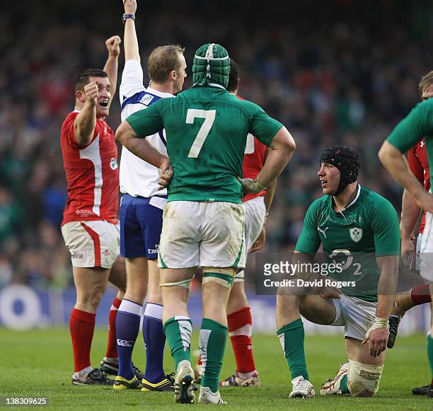 Stephen Ferris of Ireland looks dejected after being penalised in the last minute, by referee Wayne Barnes during the RBS Six Nations match between...