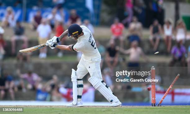 Ben Stokes of England is bowled by Jayden Seales of the West Indies during day one of the first test match between West Indies and England at Sir...