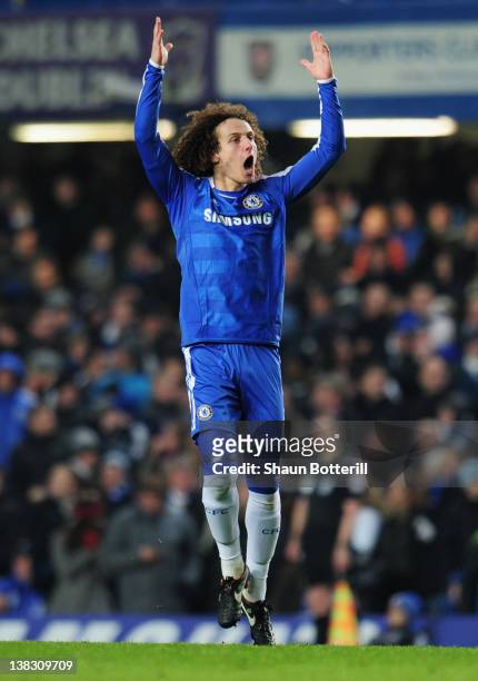David Luiz of Chelsea celebrated as he scores their third goal during the Barclays Premier League match between Chelsea and Manchester United at...