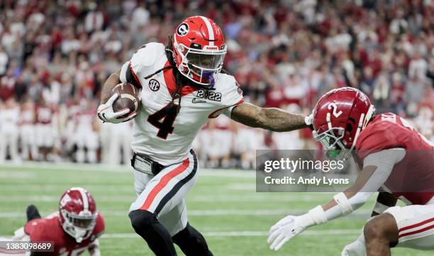 James Cook of the Georgia Bulldogs against the Alabama Crimson Tide at Lucas Oil Stadium on January 10, 2022 in Indianapolis, Indiana.