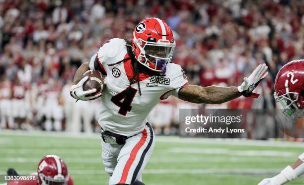 James Cook of the Georgia Bulldogs against the Alabama Crimson Tide at Lucas Oil Stadium on January 10, 2022 in Indianapolis, Indiana.