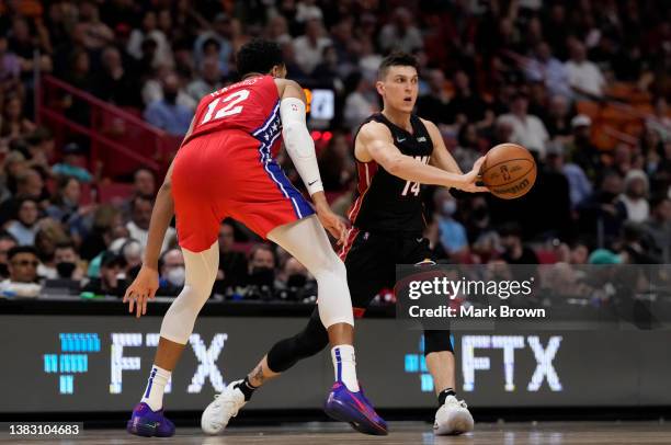 Tyler Herro of the Miami Heat passes the ball during the game against the Philadelphia 76ers at FTX Arena on March 05, 2022 in Miami, Florida. NOTE...